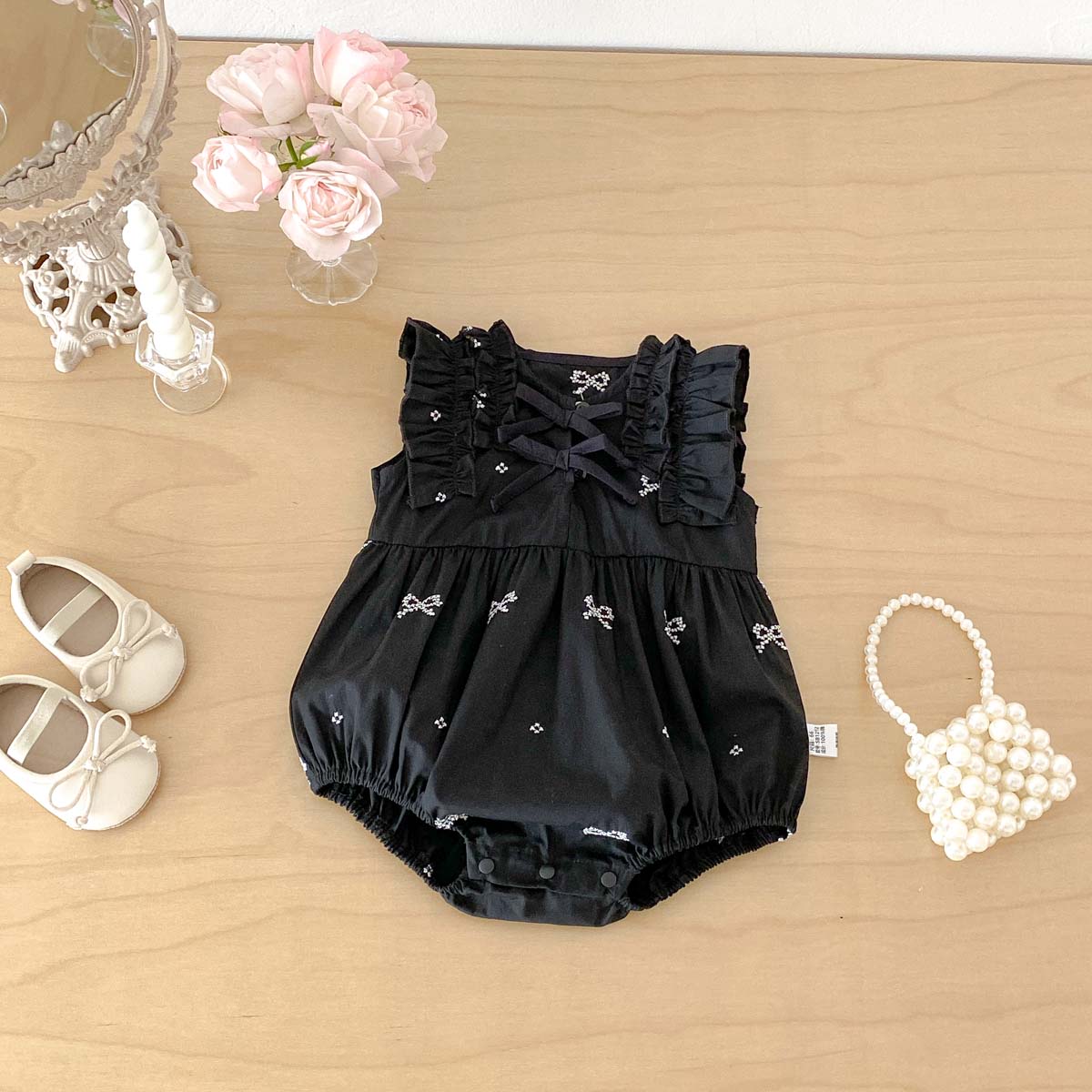 Baby Clothing Online - Zwarte romper met strikprint voor babymeisjes,