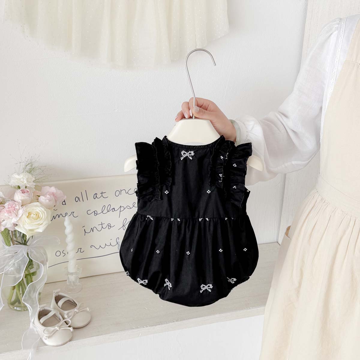 Zwarte romper met strikprint v - Baby Clothing Online recensie en prijs
