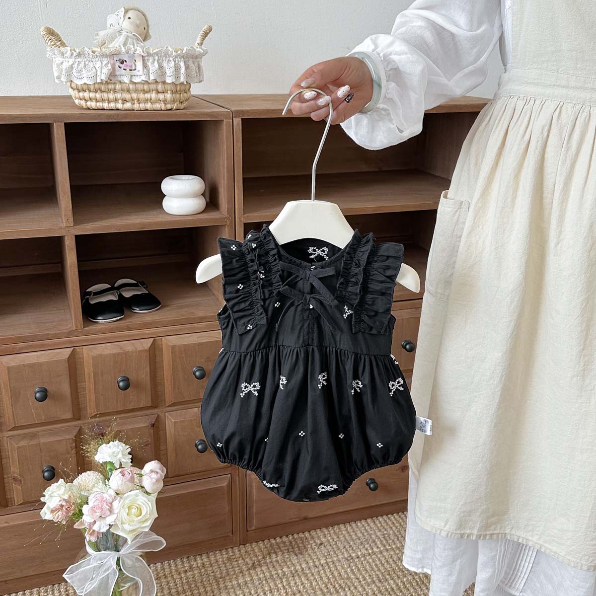 Zwarte romper met strikprint v - Baby Clothing Online recensie en prijs